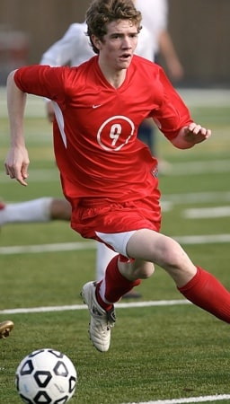 Football player kicking the ball